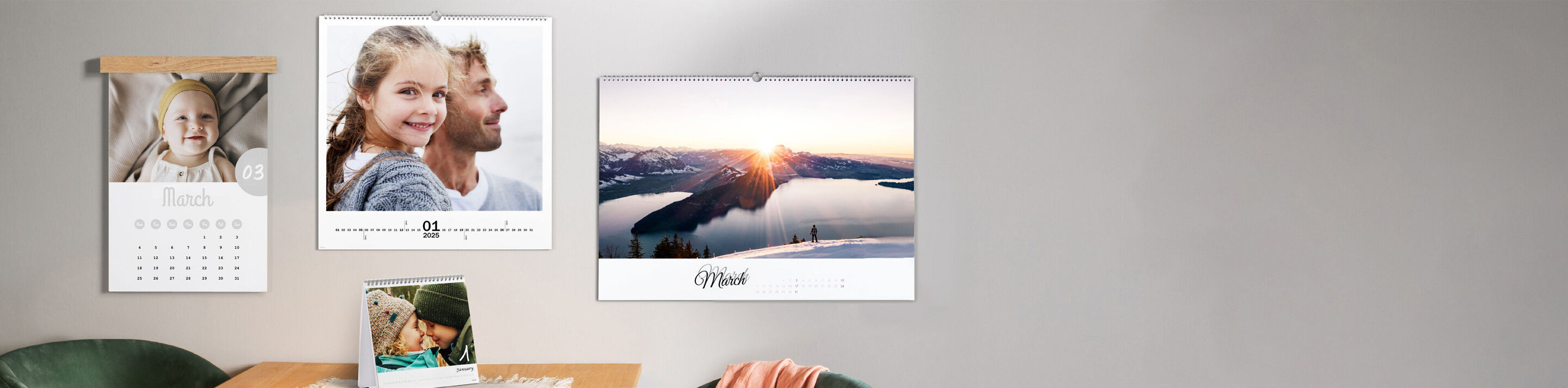 Selection of small to large photo calendars hanging on the wall