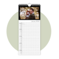 A wall calendar with a picture of father and child in nature. January 2024 is visible.